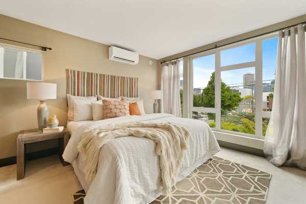 Professional painter working efficiently in modern home interior